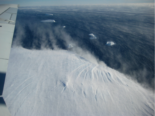 Snow blowing off the ice and out to sea, over the Amundsen Sea. Photo: Kirsty Tinto
