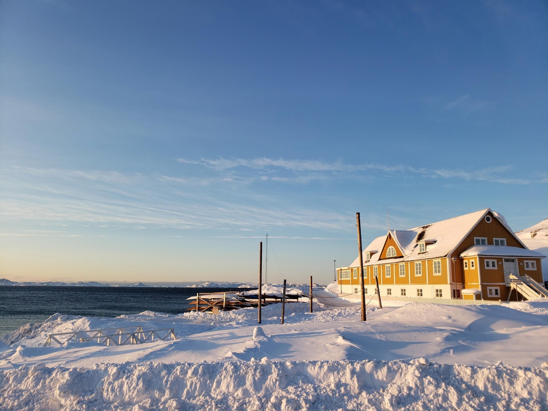 A house and pier on the snowy coastline of Nuuk, Greenland. Photo: Dave Porter (LDEO)