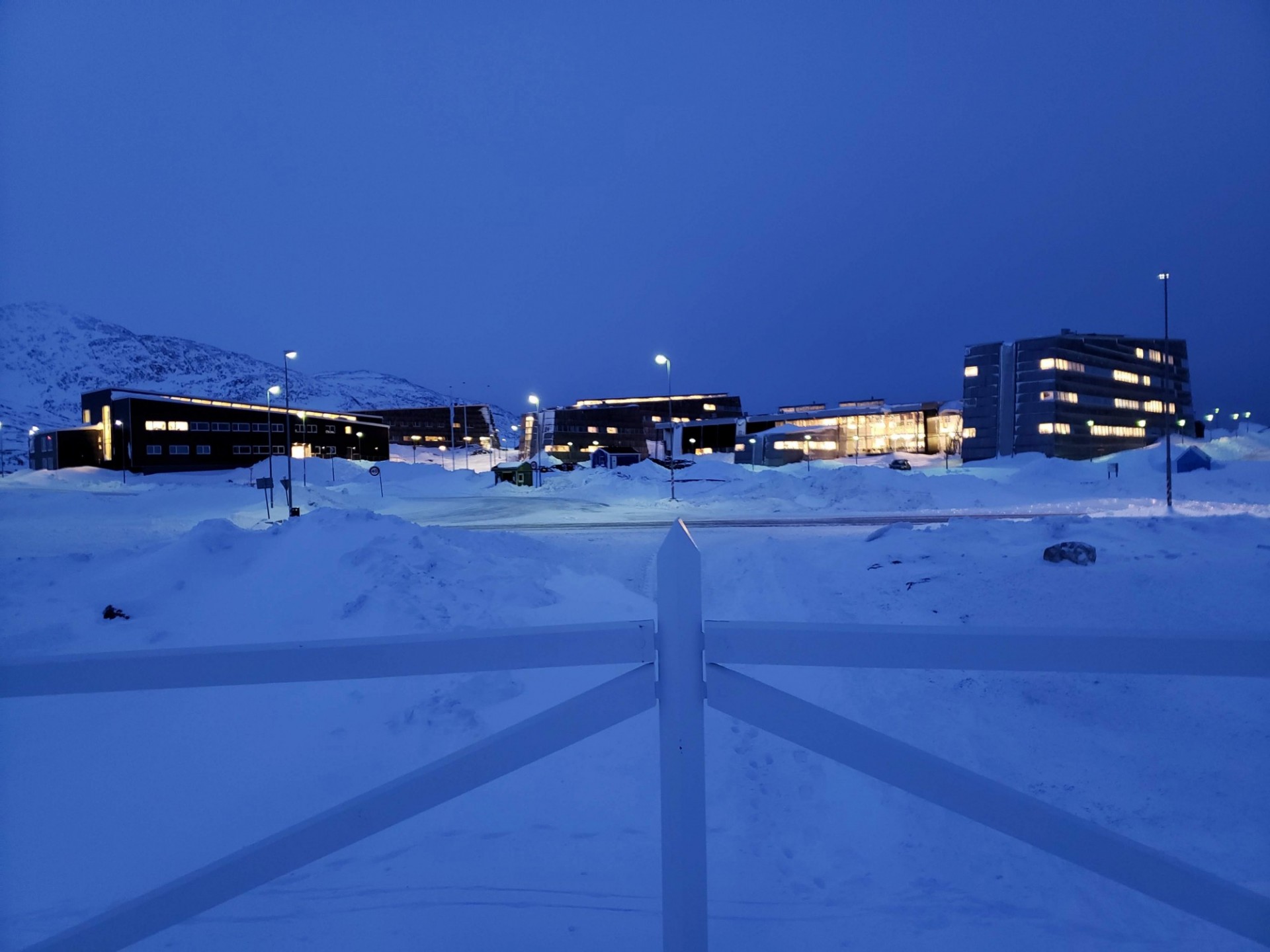 Nuuk Greenland at night with building windows illuminated