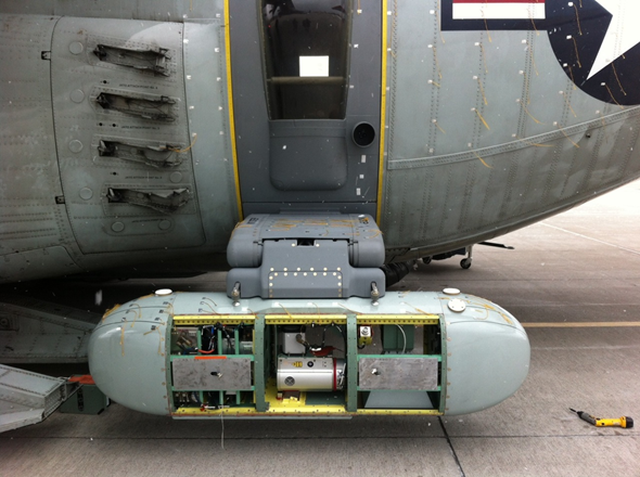 IcePod attached to aircraft, internal sensors visible. Photo: Nicholas Frearson (LDEO)