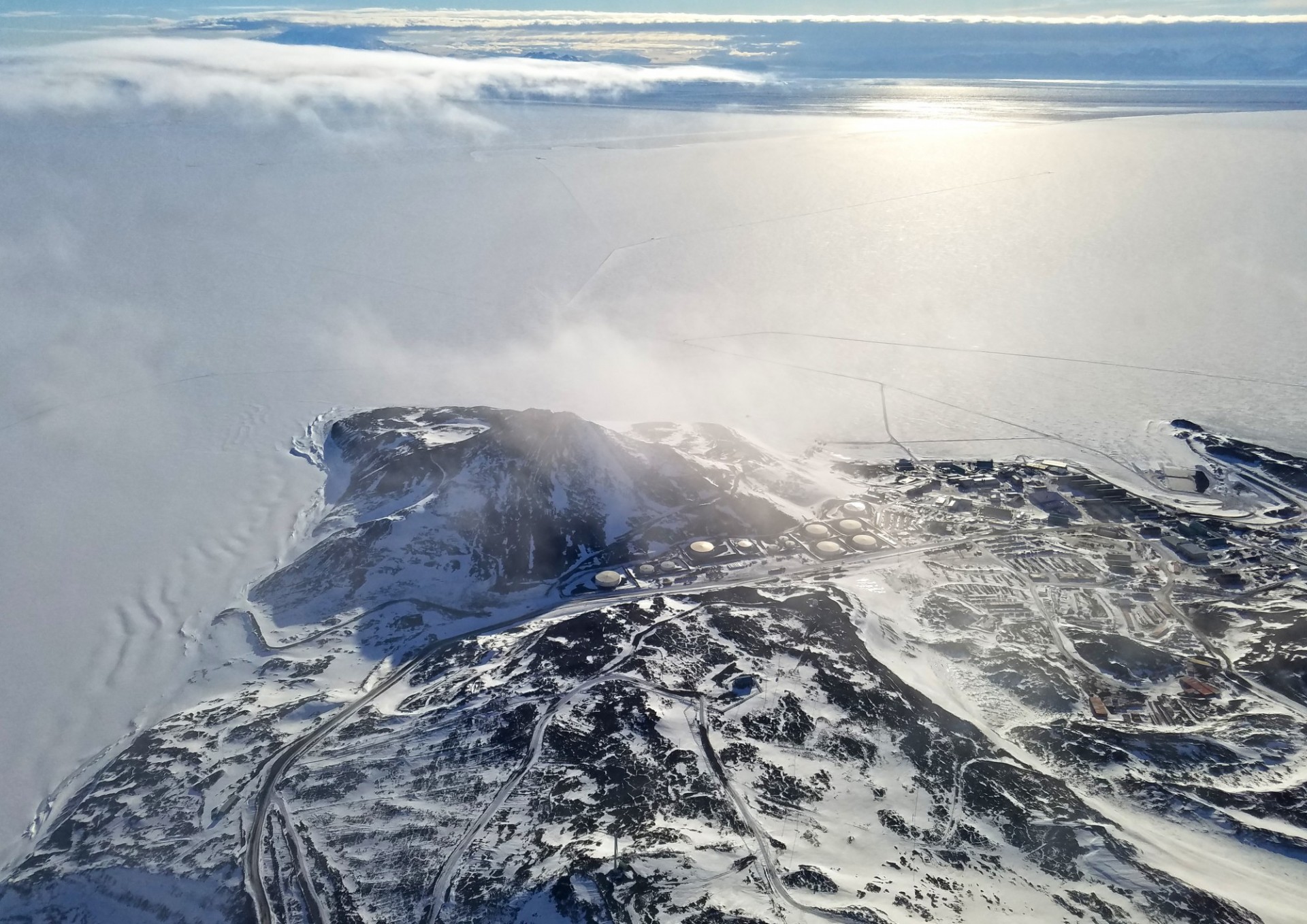 Photo of McMurdo Station and McMurdo Sound from airplane. Photo: Beth Burton (USGS)