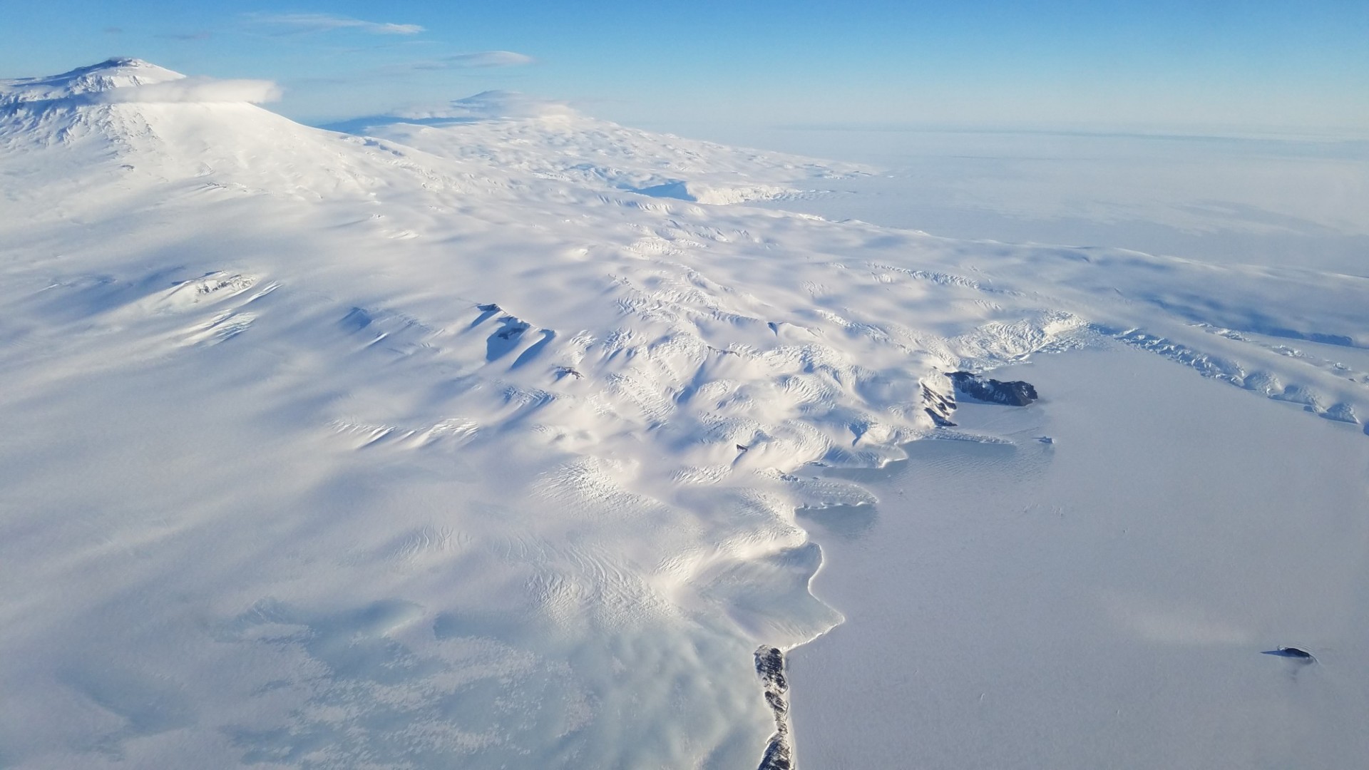 Mount Erebus and Erebus Ice Tongue from airplane. Photo: Beth Burton (USGS)